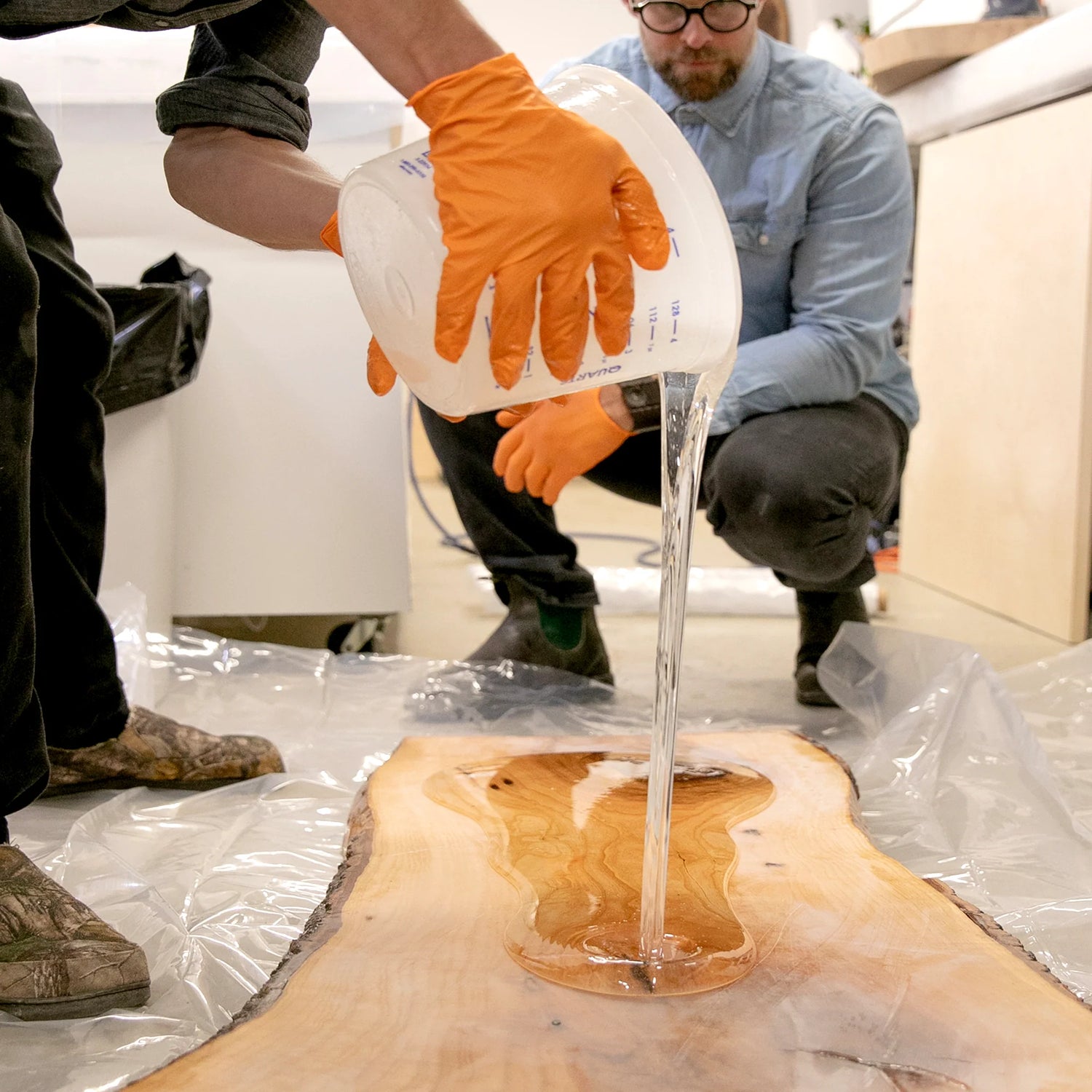 Pouring of a 15 Gallon Kit Rock-Hard Epoxy Resin.