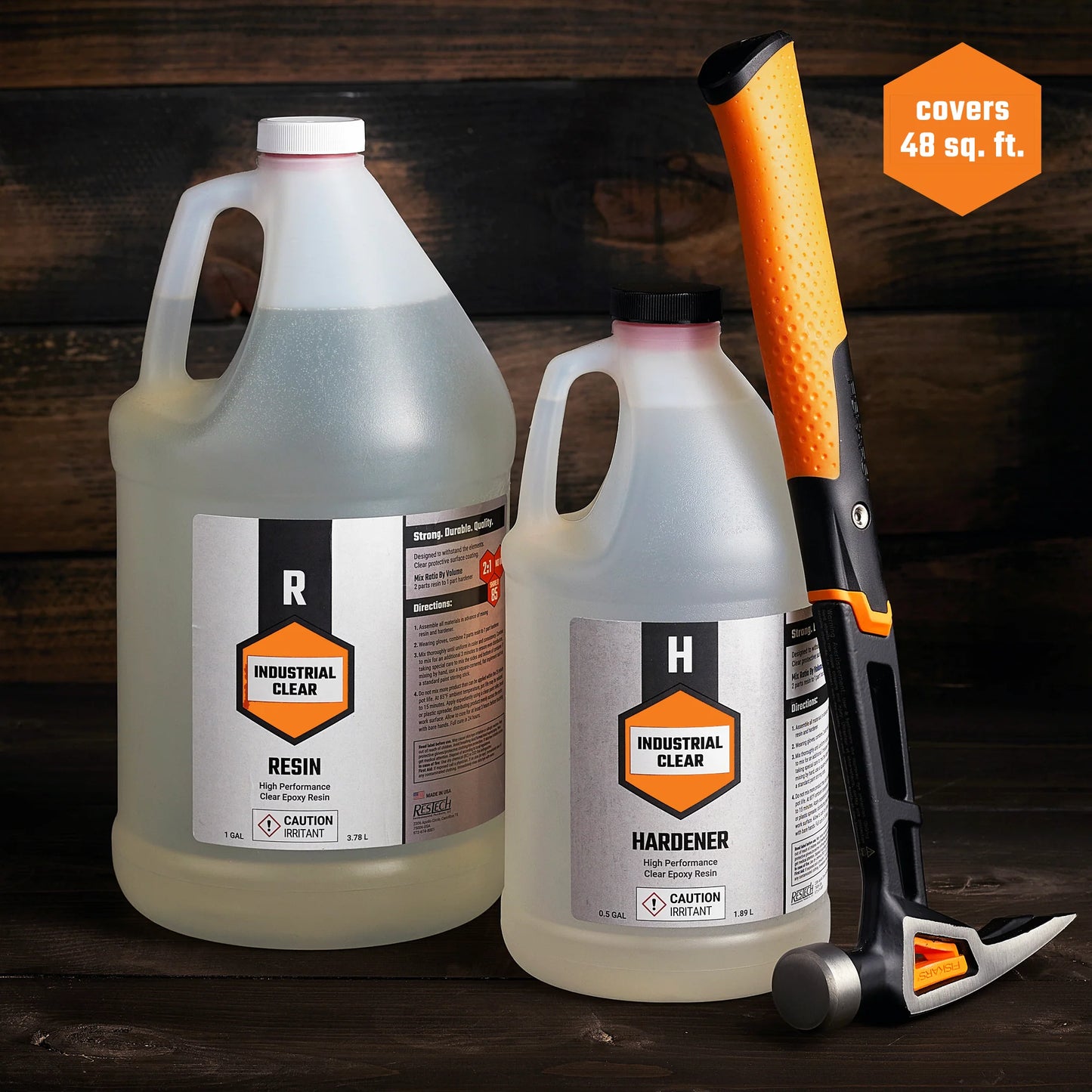 Two containers, one labeled as  1 gal resin and the other as 0.5 gal hardener, an epoxy resin  1.5 gallon kit.