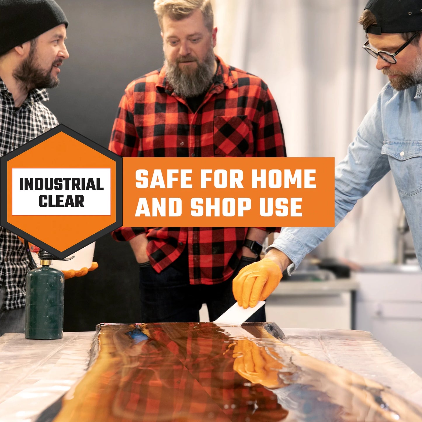 Men pouring of rock-hard epoxy resin from Industrial Clear.