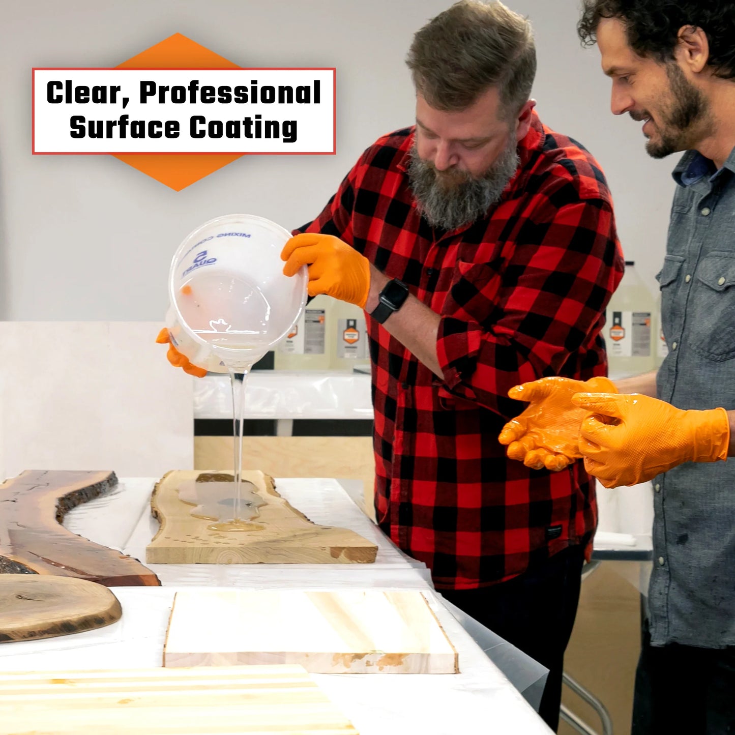 A man pouring 15 Gallon Kit Rock-Hard Epoxy Resin.
